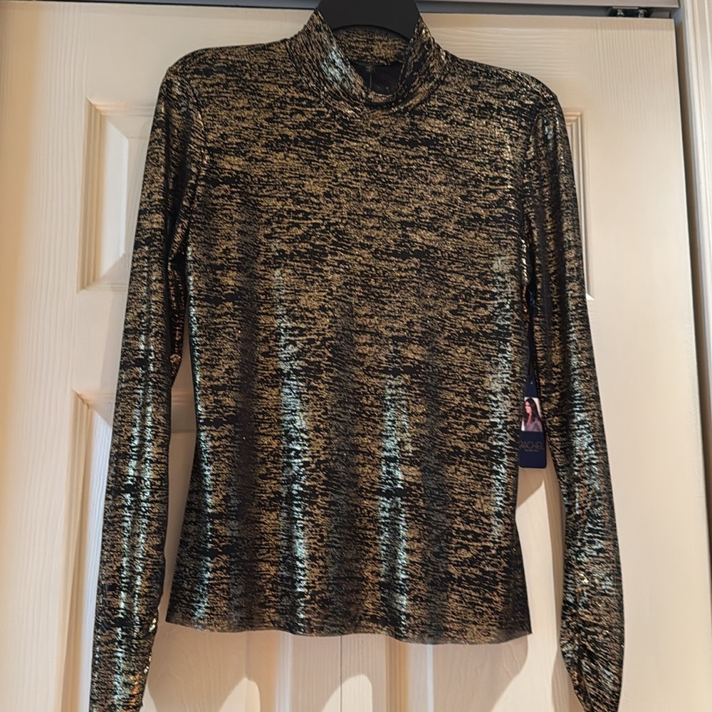 Raquel Roy, Stefanon, metallic gold, and black top